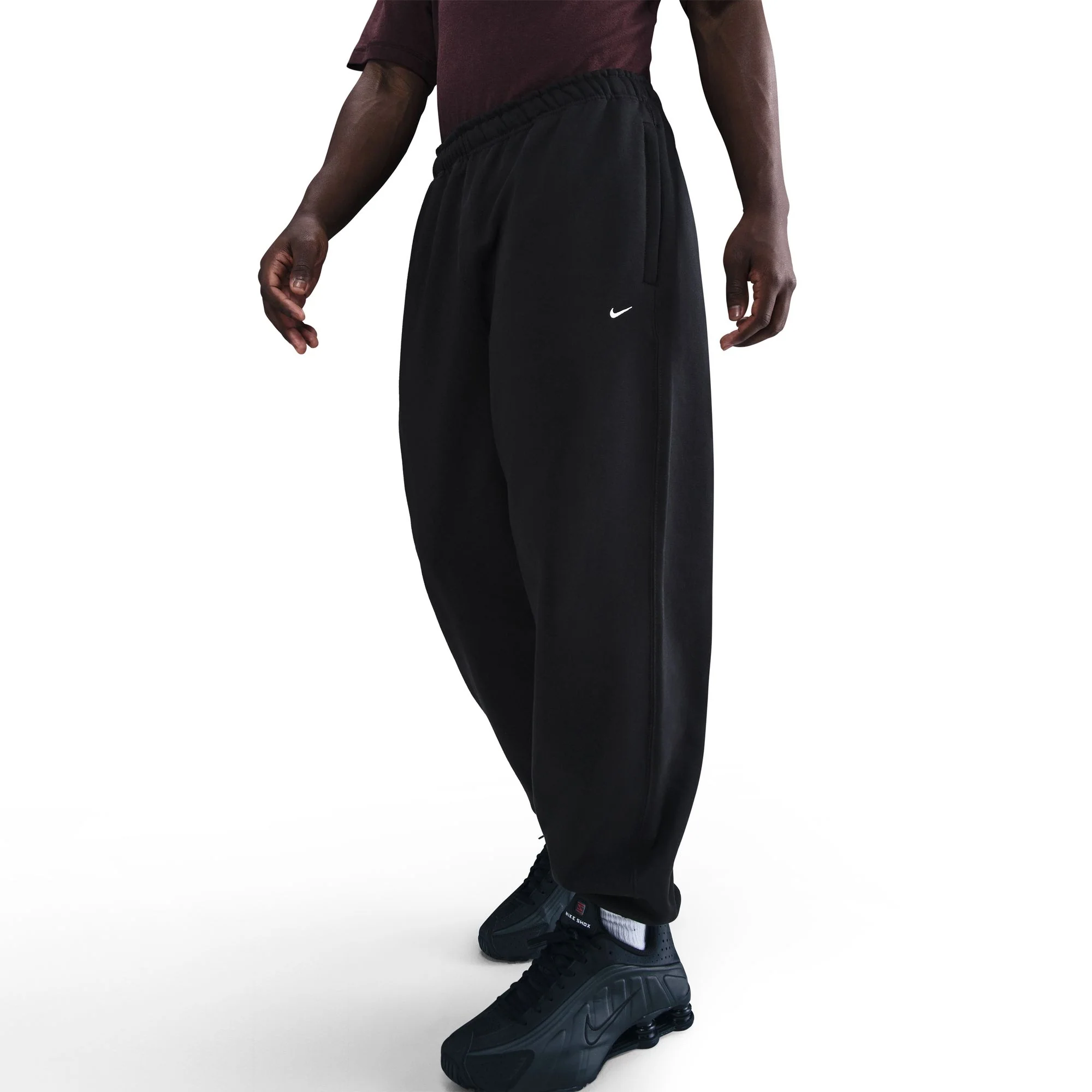 SOLO SWOOSH CUFFED FLEECE PANTS